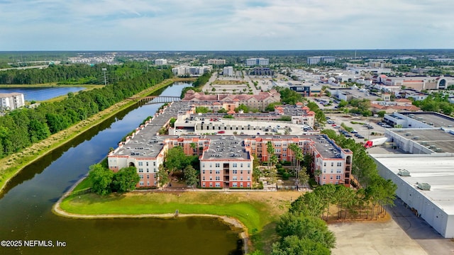drone / aerial view with a water view