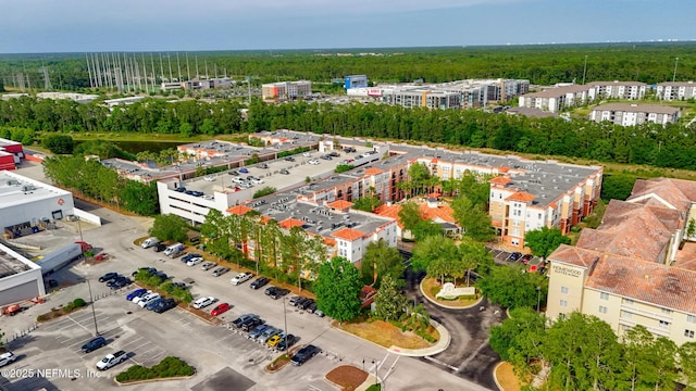 aerial view featuring a view of trees