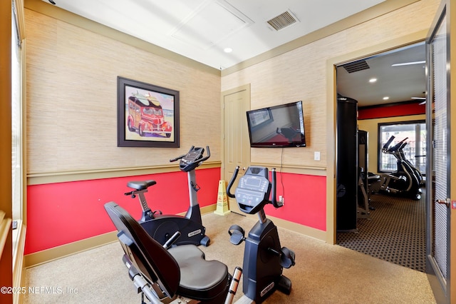 workout area featuring baseboards, carpet floors, and visible vents