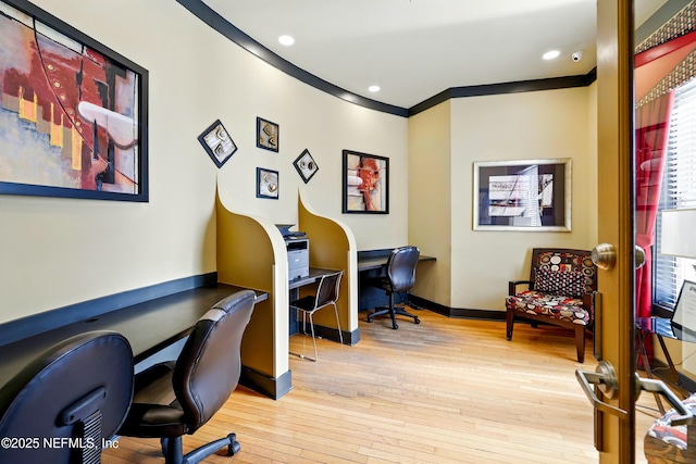 home office featuring recessed lighting, baseboards, and hardwood / wood-style flooring