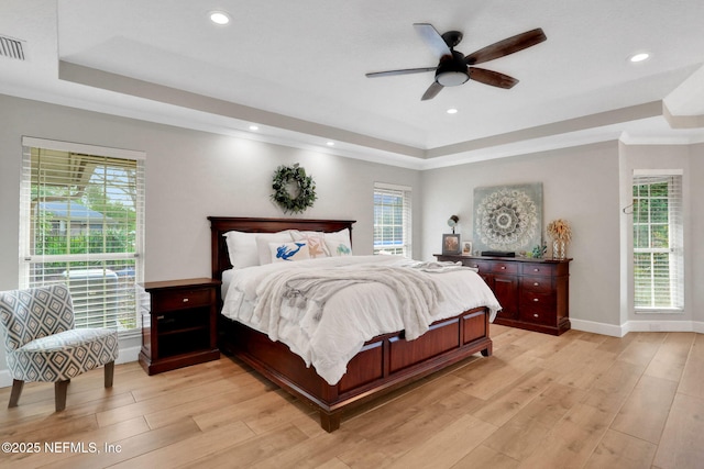 3626 Kapalua Ct, Green Cove Springs, FL 32043 - bedroom featuring recessed lighting, baseboards, a raised ceiling, and light wood-style floors