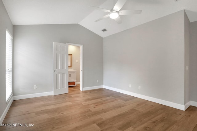 3626 Kapalua Ct, Green Cove Springs, FL 32043 - unfurnished bedroom featuring visible vents, light wood-style flooring, vaulted ceiling, and multiple windows