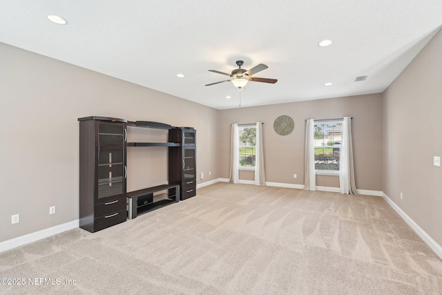 2968 Ravine Hill Dr, Middleburg, FL 32068 - unfurnished living room featuring recessed lighting, a ceiling fan, light carpet, and baseboards