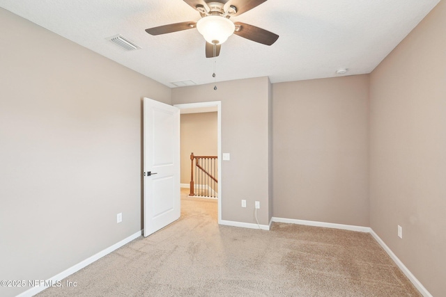 2968 Ravine Hill Dr, Middleburg, FL 32068 - spare room featuring a ceiling fan, carpet flooring, and baseboards