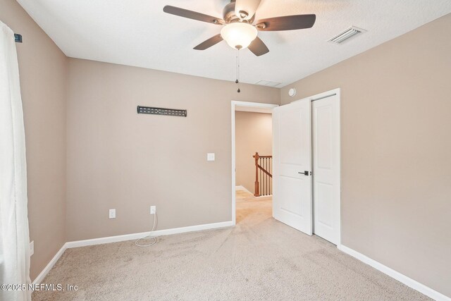 2968 Ravine Hill Dr, Middleburg, FL 32068 - unfurnished bedroom with carpet floors, baseboards, and a closet