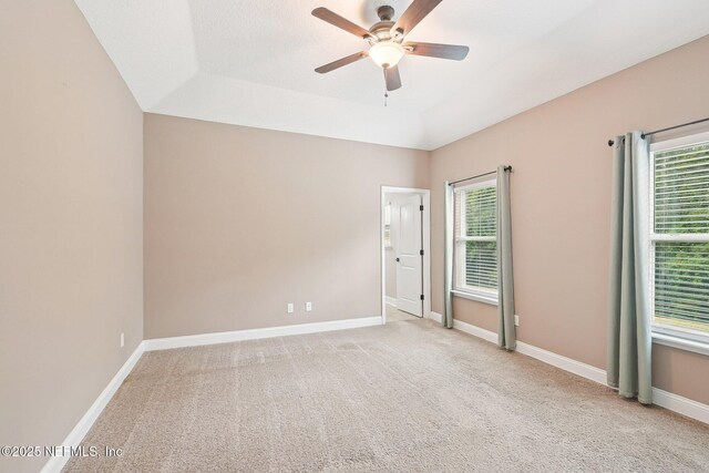 2968 Ravine Hill Dr, Middleburg, FL 32068 - carpeted spare room featuring a ceiling fan, baseboards, and a tray ceiling