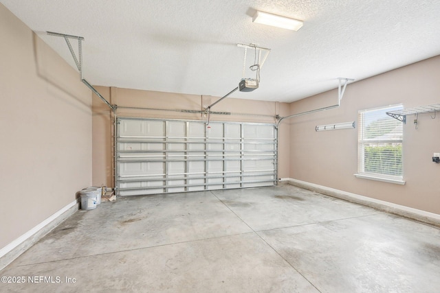 2968 Ravine Hill Dr, Middleburg, FL 32068 - garage featuring baseboards and a garage door opener