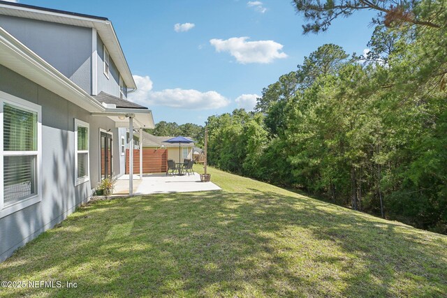 2968 Ravine Hill Dr, Middleburg, FL 32068 - view of grassy yard featuring a patio