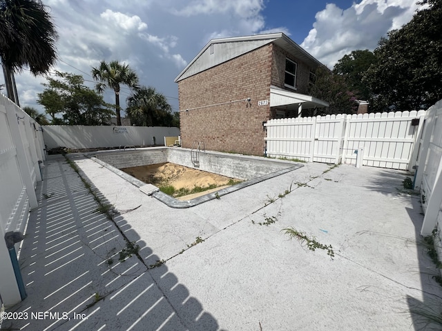 2673 Trollie Ln Unit 1, Jacksonville, FL 32211 - view of swimming pool with a fenced backyard