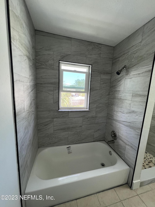 2673 Trollie Ln Unit 1, Jacksonville, FL 32211 - bathroom featuring tile patterned flooring, a shower, and a tub