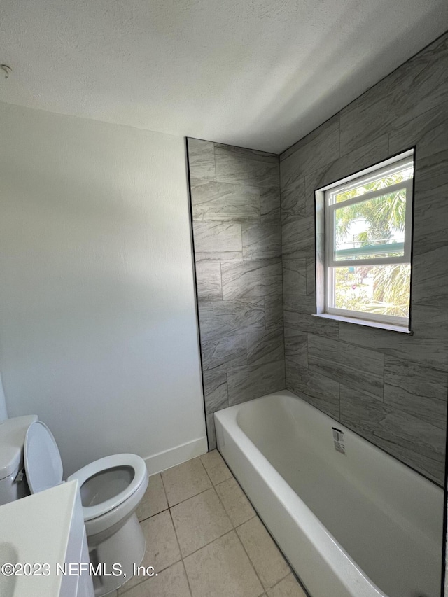 2673 Trollie Ln Unit 1, Jacksonville, FL 32211 - full bath featuring toilet, tile patterned floors, baseboards, and vanity