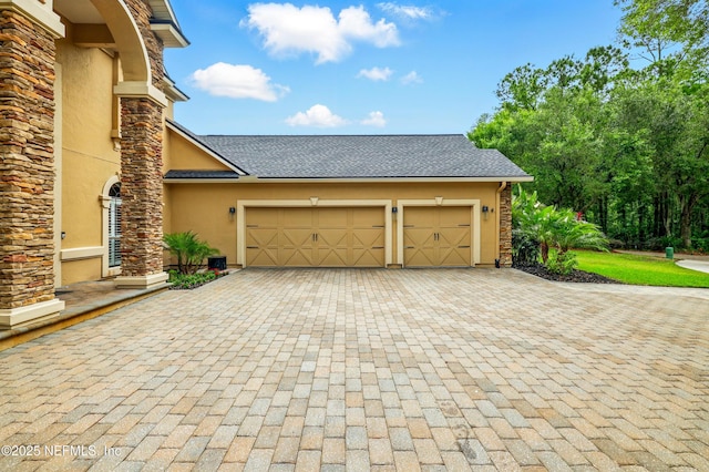 725 Carthage Pl, Saint Johns, FL 32259 - garage featuring decorative driveway