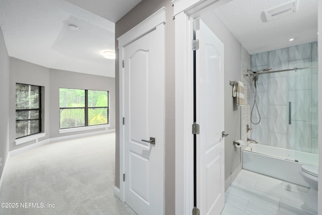 725 Carthage Pl, Saint Johns, FL 32259 - bathroom featuring shower / washtub combination, baseboards, toilet, and a textured ceiling