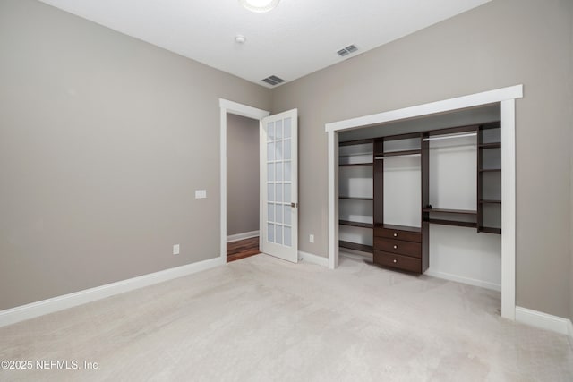 725 Carthage Pl, Saint Johns, FL 32259 - unfurnished bedroom featuring carpet floors, a closet, baseboards, and french doors
