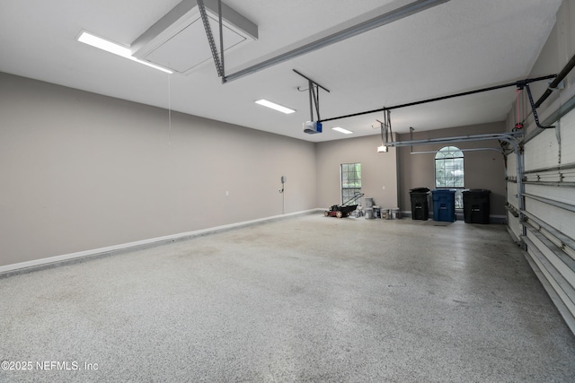 725 Carthage Pl, Saint Johns, FL 32259 - garage with a garage door opener and baseboards
