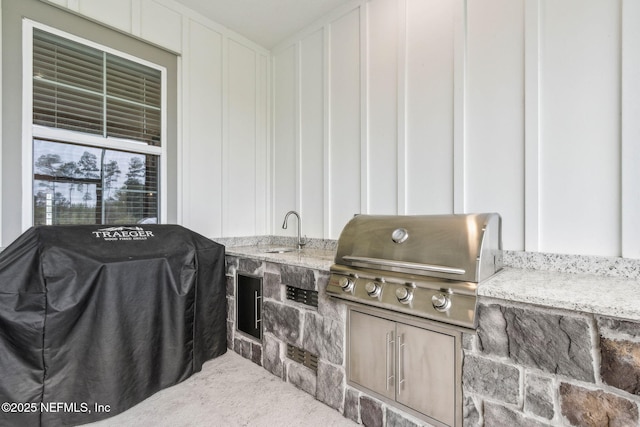 36039 Pitch Ln, Hilliard, FL 32046 - view of patio / terrace featuring a grill, a sink, and exterior kitchen