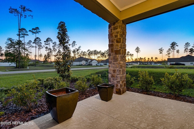 36039 Pitch Ln, Hilliard, FL 32046 - view of patio terrace at dusk