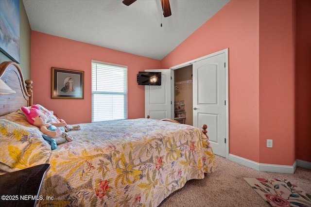 carpeted bedroom featuring baseboards, ceiling fan, a closet, and lofted ceiling
