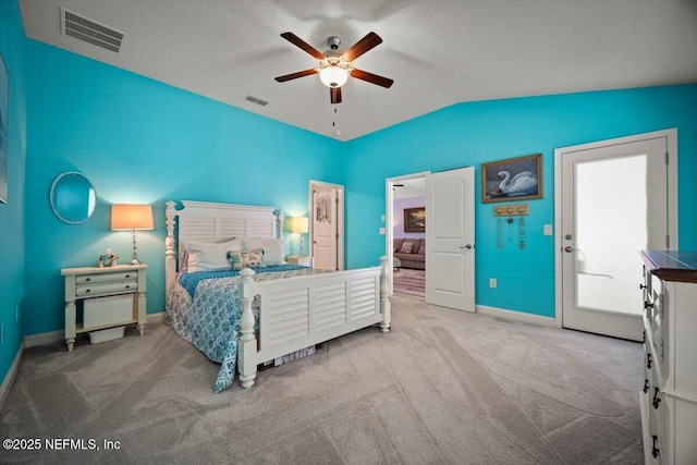 bedroom featuring carpet floors, baseboards, visible vents, and vaulted ceiling