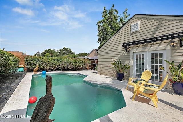 12322 Mastin Cove Rd, Jacksonville, FL 32225 - view of swimming pool with french doors, a patio, and a fenced backyard