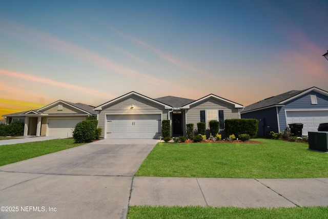 2471 Cold Stream Ln, Green Cove Springs, FL 32043 - ranch-style home with a yard, an attached garage, and concrete driveway
