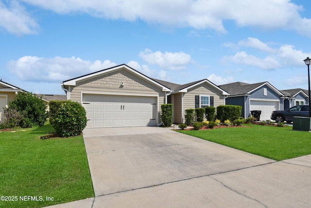 2471 Cold Stream Ln, Green Cove Springs, FL 32043 - single story home with concrete driveway, a front yard, and an attached garage