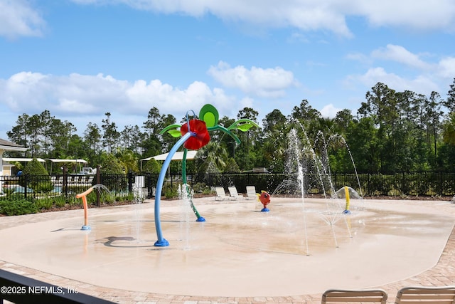 2471 Cold Stream Ln, Green Cove Springs, FL 32043 - view of playground featuring fence and view of scattered trees