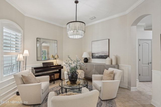90 Kenmore Ave, Ponte Vedra, FL 32081 - sitting room featuring arched walkways, a chandelier, and crown molding