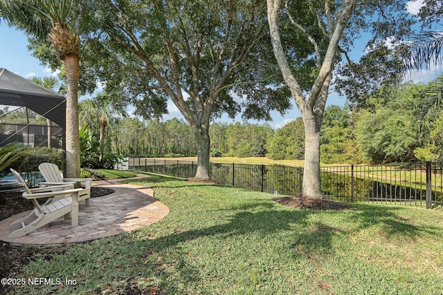 90 Kenmore Ave, Ponte Vedra, FL 32081 - view of yard featuring a patio area, a water view, and glass enclosure