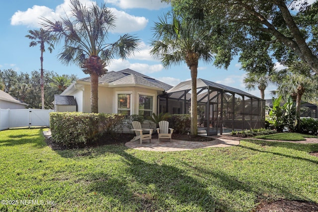 90 Kenmore Ave, Ponte Vedra, FL 32081 - rear view of house featuring a patio, stucco siding, a lanai, and a gate