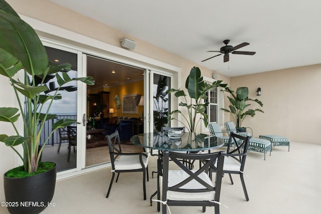 view of patio / terrace with a ceiling fan and outdoor dining area