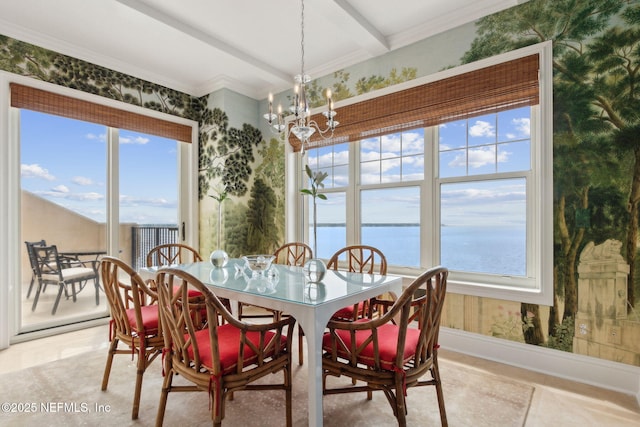 dining area featuring wallpapered walls, a chandelier, healthy amount of natural light, beam ceiling, and ornamental molding