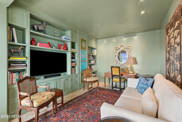 living area with built in shelves