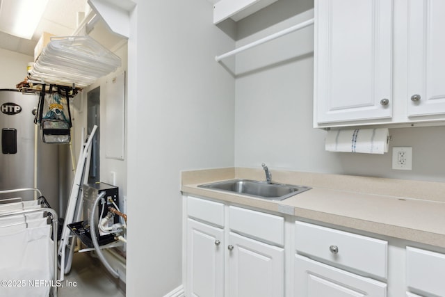 washroom with cabinet space and washer and dryer
