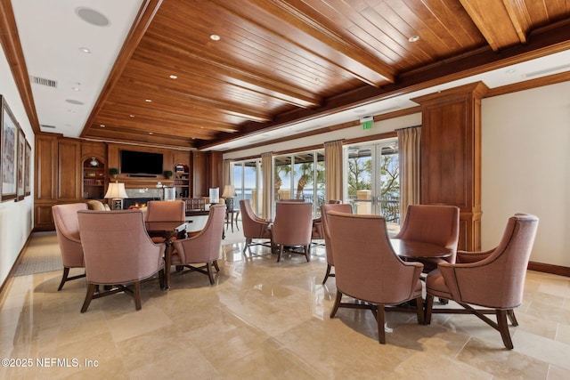 dining space featuring wooden ceiling, beam ceiling, baseboards, and french doors