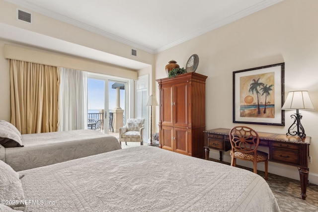 carpeted bedroom featuring access to outside, ornamental molding, and baseboards