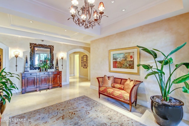 lobby featuring crown molding and recessed lighting