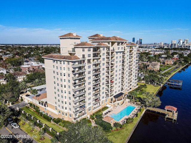 view of apartment building / complex featuring a water view