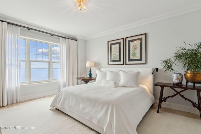 bedroom with baseboards and ornamental molding