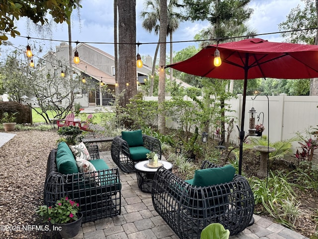 view of patio / terrace featuring a fenced backyard and an outdoor hangout area