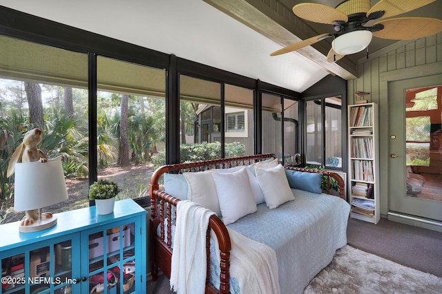 sunroom featuring healthy amount of natural light, ceiling fan, and outdoor lounge area