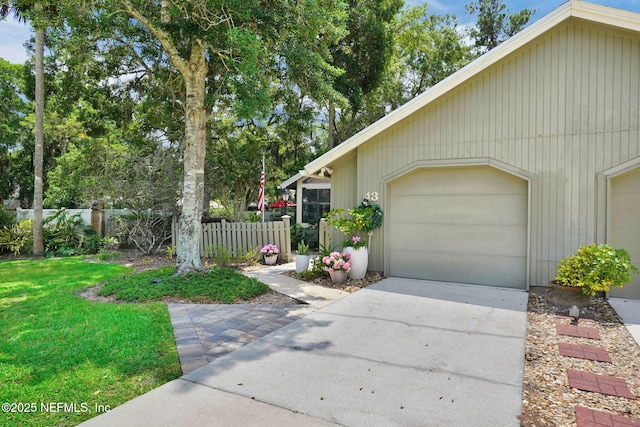 view of front of home with driveway and an attached garage