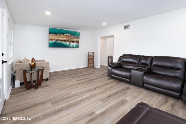 3165 Victoria Park Rd, Jacksonville, FL 32216 - living room with recessed lighting, baseboards, visible vents, and light wood-style floors