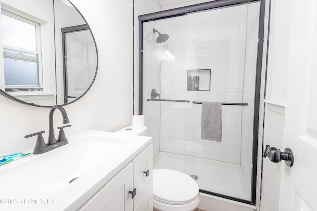 3165 Victoria Park Rd, Jacksonville, FL 32216 - bathroom featuring vanity, toilet, and a stall shower