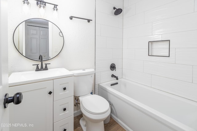 3165 Victoria Park Rd, Jacksonville, FL 32216 - bathroom with vanity, shower / bathtub combination, wood finished floors, and toilet