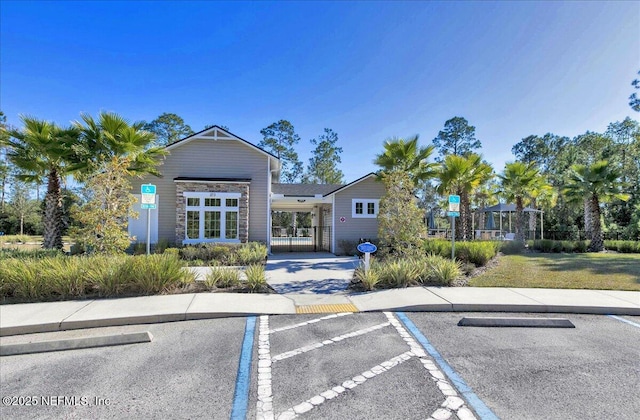 229 Adelanto Ave, Saint Augustine, FL 32092 - view of property featuring uncovered parking and fence