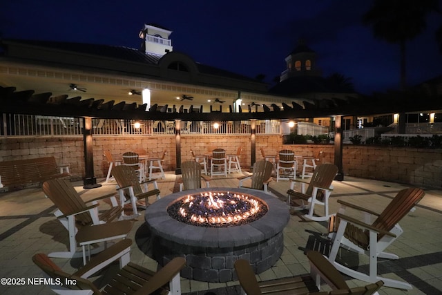 14526 Starbuck Springs Way, Jacksonville, FL 32258 - patio at night with a fire pit, a patio, and a ceiling fan