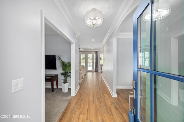 14526 Starbuck Springs Way, Jacksonville, FL 32258 - foyer with a chandelier, ornamental molding, light wood finished floors, a textured ceiling, and recessed lighting