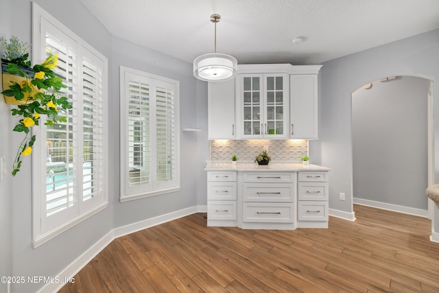 14526 Starbuck Springs Way, Jacksonville, FL 32258 - dining area featuring arched walkways and light wood-type flooring