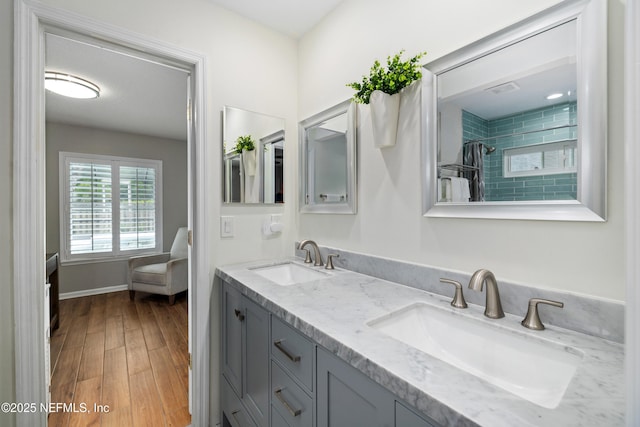 14526 Starbuck Springs Way, Jacksonville, FL 32258 - bathroom with double vanity, wood finished floors, and curtained shower